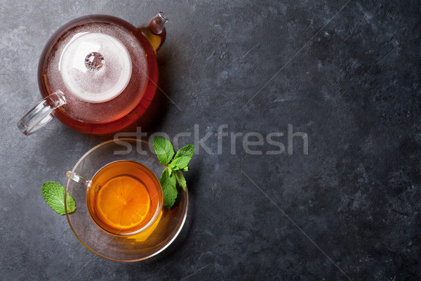Teáscsésze teáskanna kő asztal felső kilátás Stock fotó © karandaev