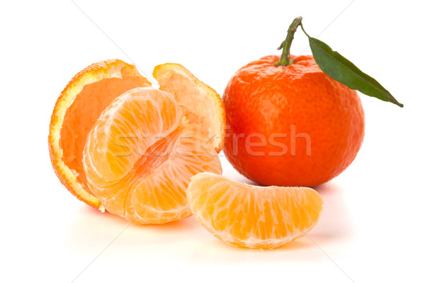 Ripe tangerines with green leaf Stock photo © karandaev