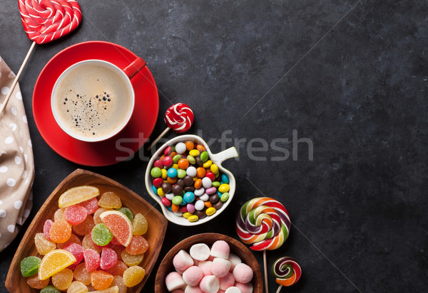 Coffee, colorful candies, jelly and marmalade Stock photo © karandaev