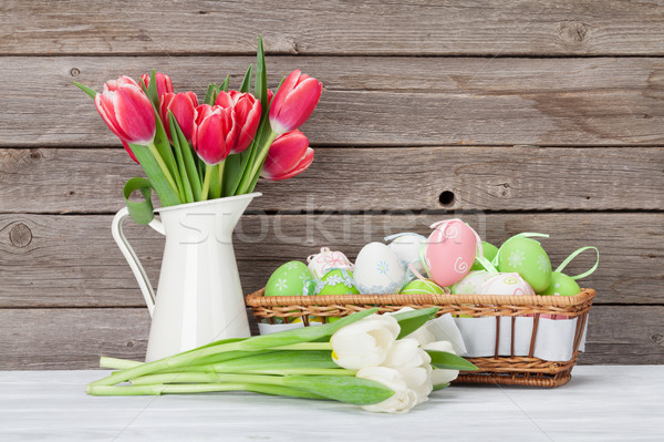 Stock photo: Easter eggs and tulips bouquet