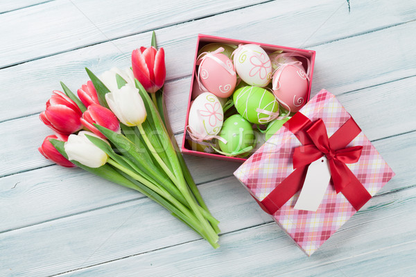 Stock photo: Easter eggs and tulips bouquet