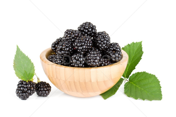 Blackberry in wooden bowl Stock photo © karandaev