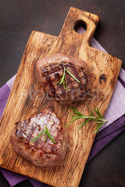 Alla griglia filetto bistecca tagliere top view Foto d'archivio © karandaev