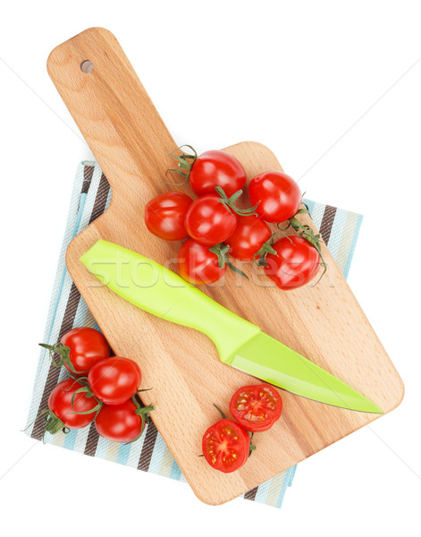 Pomidorki deska do krojenia widok z góry odizolowany biały żywności Zdjęcia stock © karandaev