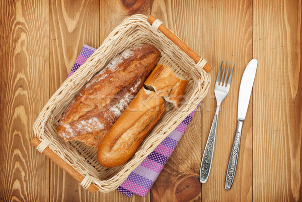 Casero pan francés mesa de madera alimentos madera mesa Foto stock © karandaev