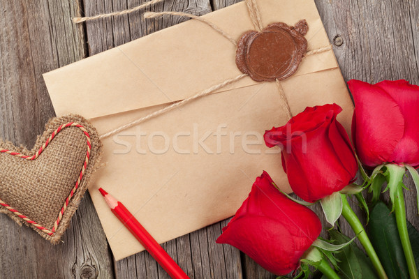 Love letter, red roses and heart Stock photo © karandaev