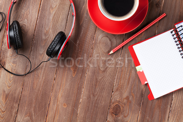 Desk notepad caffè cuffie ufficio legno Foto d'archivio © karandaev