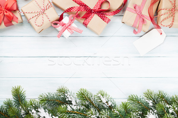 Karácsony ajándékdobozok fenyőfa ág fa asztal felső Stock fotó © karandaev