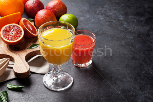 Fresh citruses and juices Stock photo © karandaev