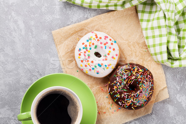 Donuts and coffee Stock photo © karandaev