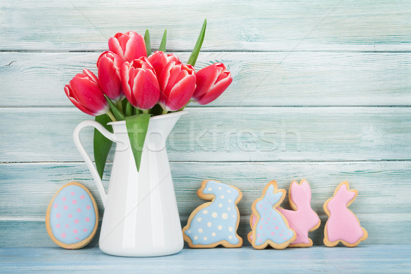 Red tulip flowers and Easter cookies Stock photo © karandaev