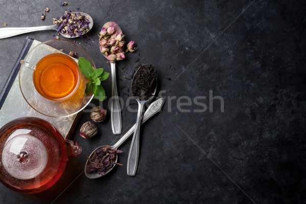 Teáscsésze válogatás száraz tea kanalak teáskanna Stock fotó © karandaev