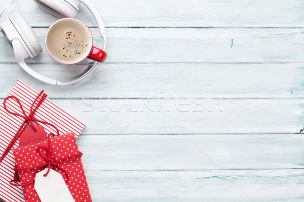Christmas background with gifts, coffee and headphones Stock photo © karandaev