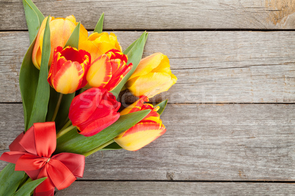 Stock photo: Fresh colorful tulips bouquet with ribbon and bow