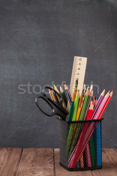 School and office supplies on classroom table Stock photo © karandaev