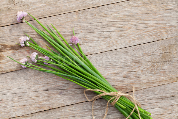 Fresh garden spring onion on garden table Stock photo © karandaev