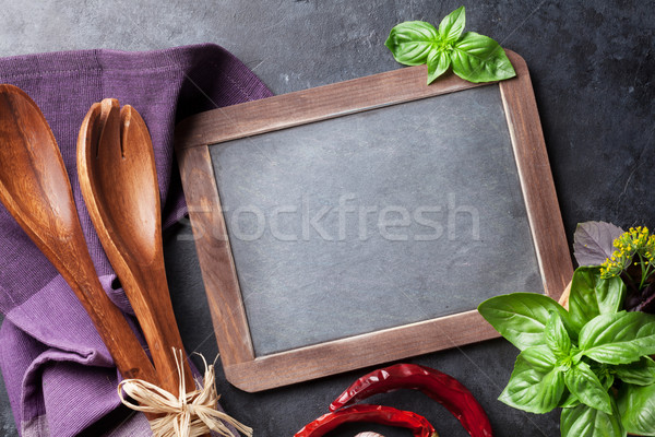 Blackboard for your text and garden herbs Stock photo © karandaev