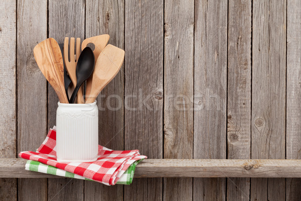 Kitchen utensils on shelf Stock photo © karandaev