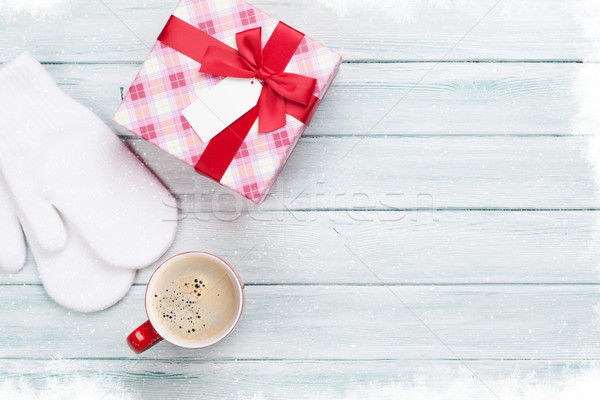Christmas gift box, coffee and mittens Stock photo © karandaev