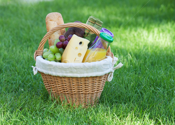 Açık piknik sepeti yeşil çim ekmek peynir Stok fotoğraf © karandaev