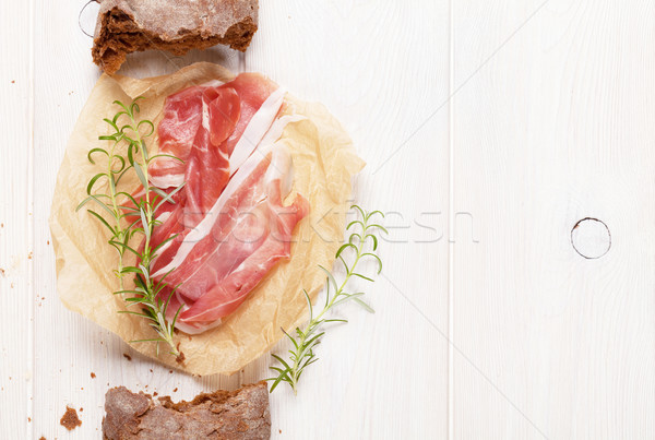 Italienisch Prosciutto weiß Holztisch top Ansicht Stock foto © karandaev