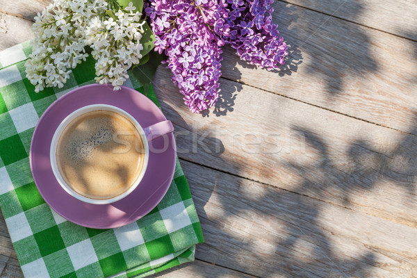 Kávéscsésze színes orgona virágok kert asztal Stock fotó © karandaev
