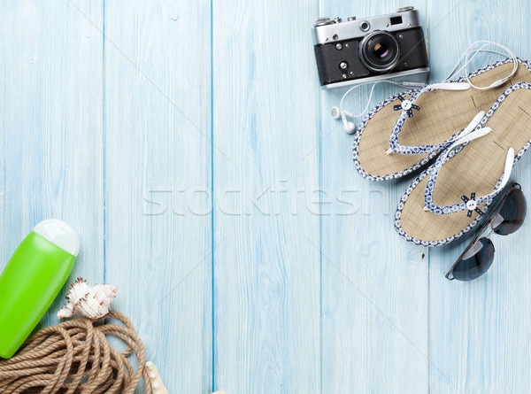 Travel and vacation items on wooden table Stock photo © karandaev