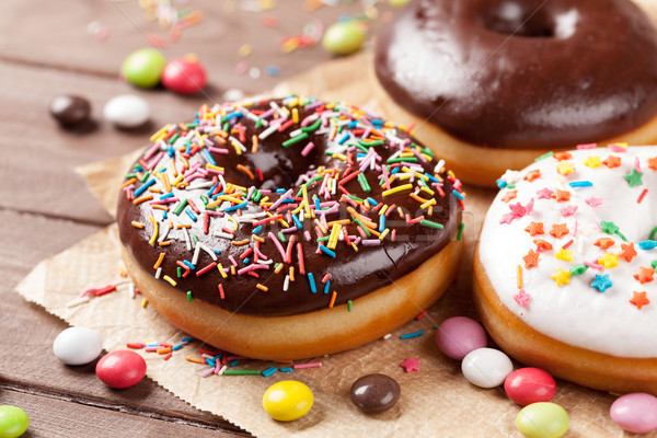 Donuts and candies Stock photo © karandaev