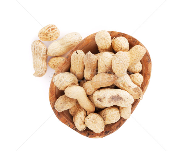 Pinda noten kom geïsoleerd witte achtergrond Stockfoto © karandaev