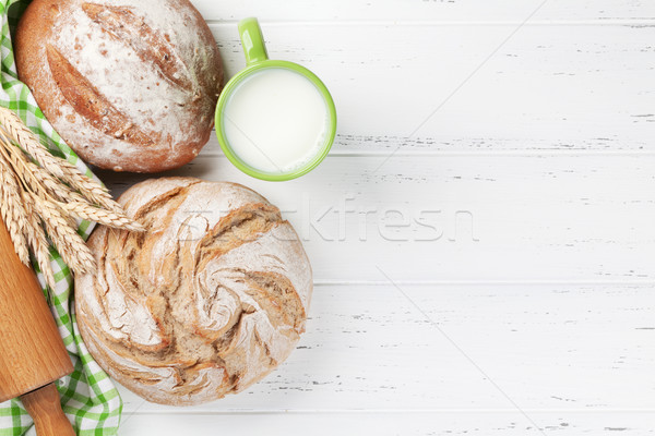 Homemade crusty bread and milk Stock photo © karandaev