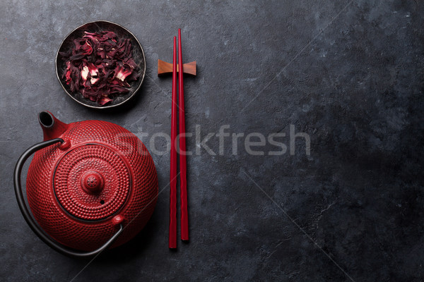 Red tea pot and sushi chopsticks Stock photo © karandaev
