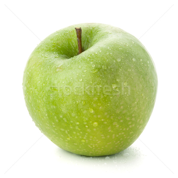 Stock photo: A ripe green apple with water drops