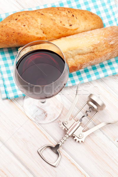Vörösbor kenyér dugóhúzó fehér fa asztal étel Stock fotó © karandaev