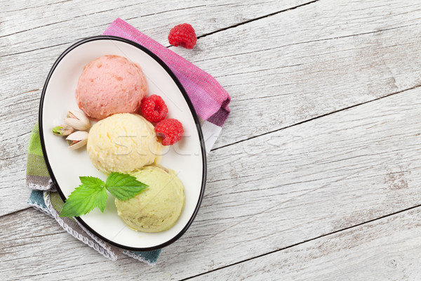 Ice cream with nuts and berries Stock photo © karandaev