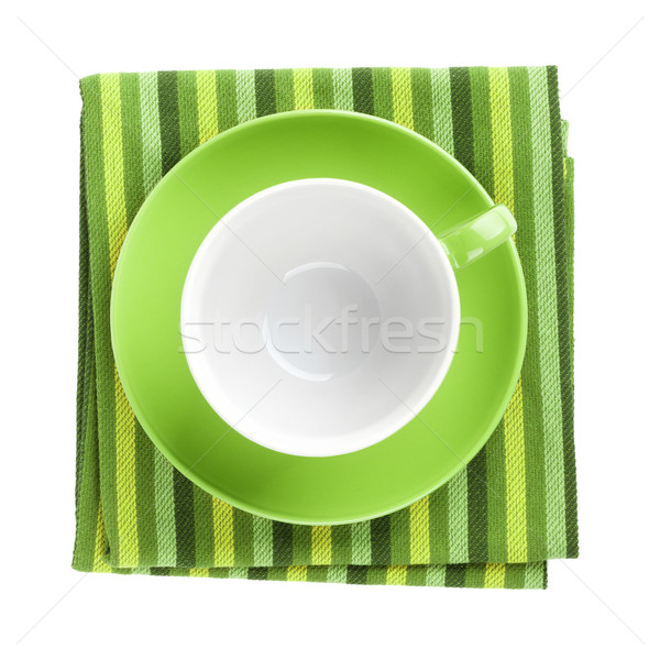 Green coffee cup over kitchen towel Stock photo © karandaev