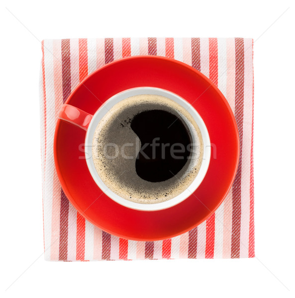 Red coffee cup over kitchen towel Stock photo © karandaev