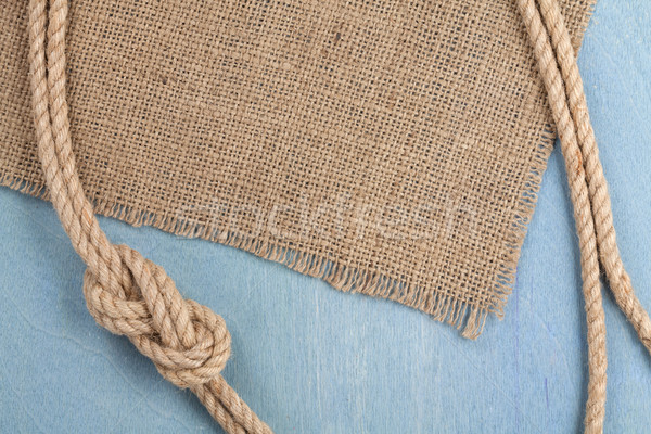 Ship rope on old wooden texture background Stock photo © karandaev