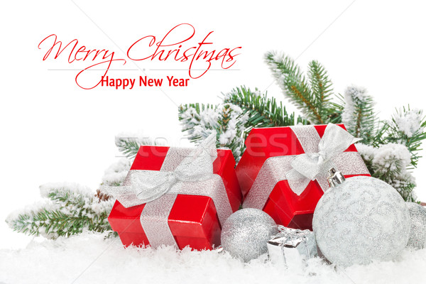 Christmas baubles and red gift boxes with snow fir tree Stock photo © karandaev