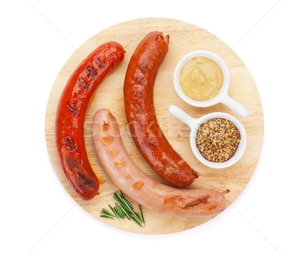 Stock photo: Various grilled sausages with condiments