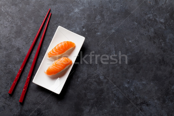 Set of salmon nigiri sushi and chopsticks Stock photo © karandaev