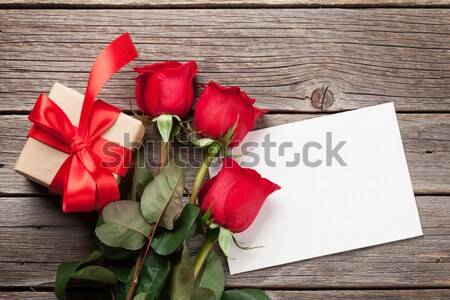 Red roses and greeting card Stock photo © karandaev