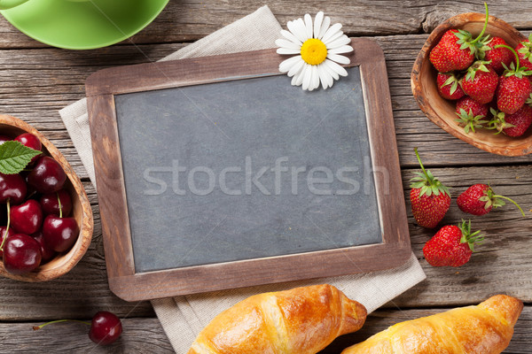 Lousa croissants café flores xícara de café Foto stock © karandaev