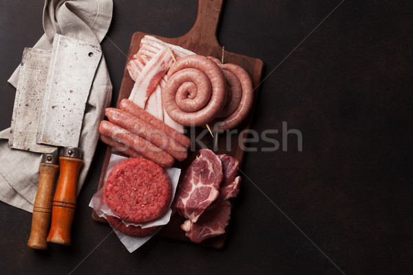 Raw meat and sausages Stock photo © karandaev