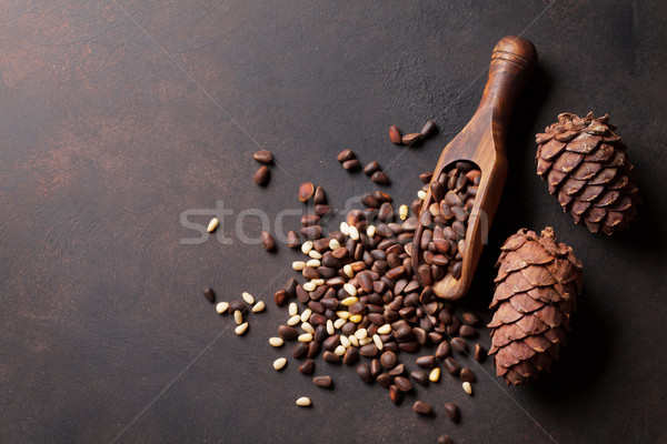 Stock photo: Pine nuts on stone table