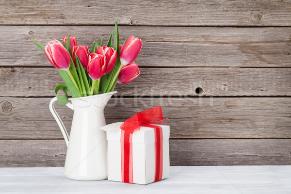 Red tulips bouquet and gift box Stock photo © karandaev