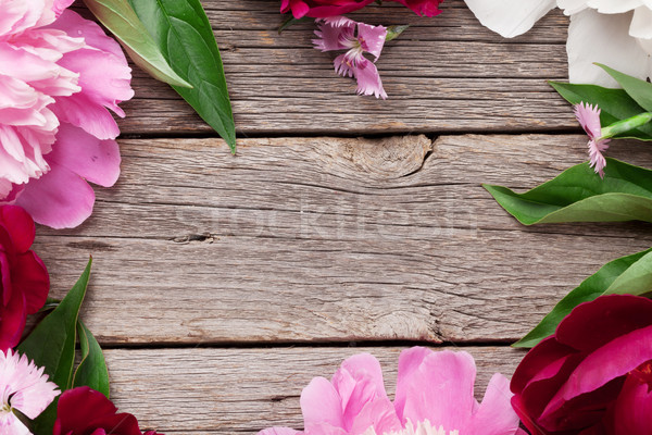 Stock photo: Garden peony flowers on wood