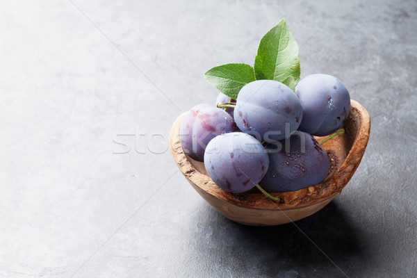 Stockfoto: Tuin · pruimen · kom · steen · tabel