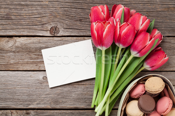 Red tulip flowers and macaroon cookies Stock photo © karandaev