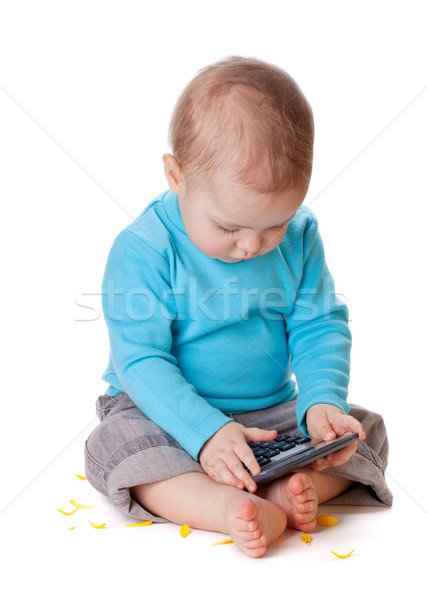 Wenig Baby spielen Rechner isoliert weiß Stock foto © karandaev