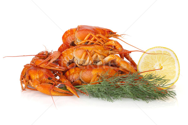 Stock photo: Boiled crayfishes with lemon slice and dill